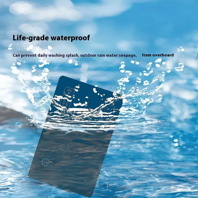 Ultra-thin black anti-loss card with 550mAh battery for Apple devices in a wallet