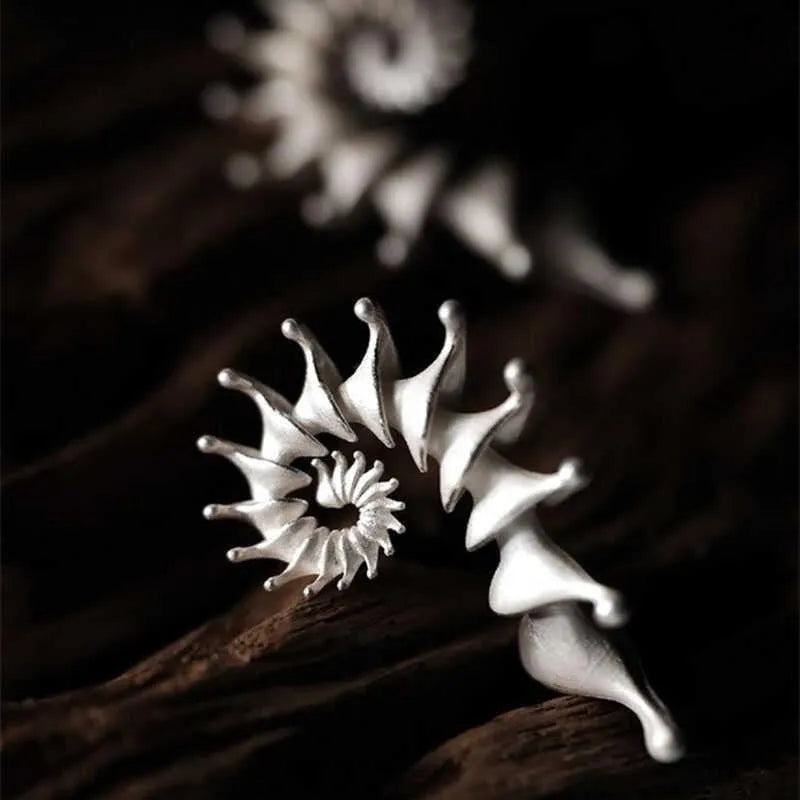 Conch three-dimensional matte stud earrings with exaggerated alloy design and electroplated finish