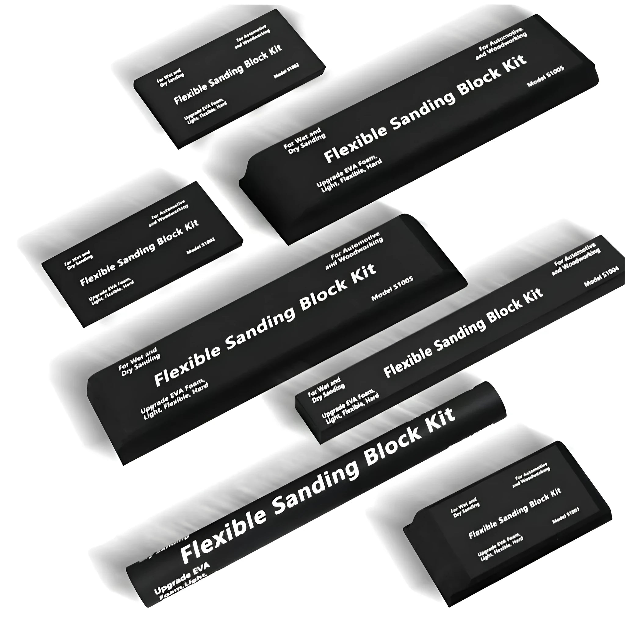 Seven black frosted metal building blocks arranged for architectural model assembly