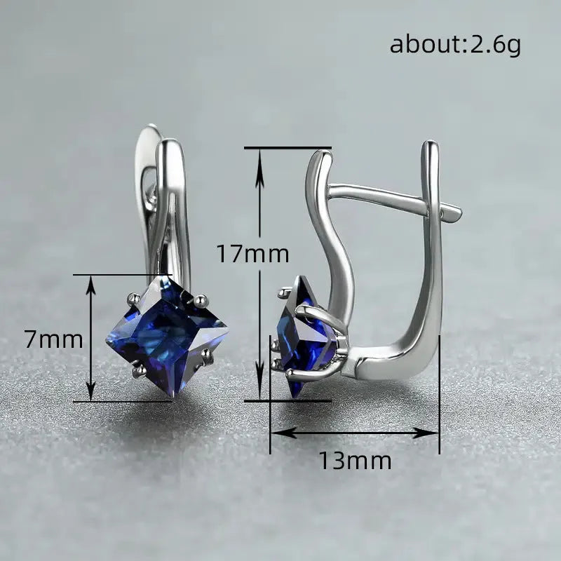 Women's copper earrings with a diamond design and inlaid zircon treatment in blue, green, or colour.