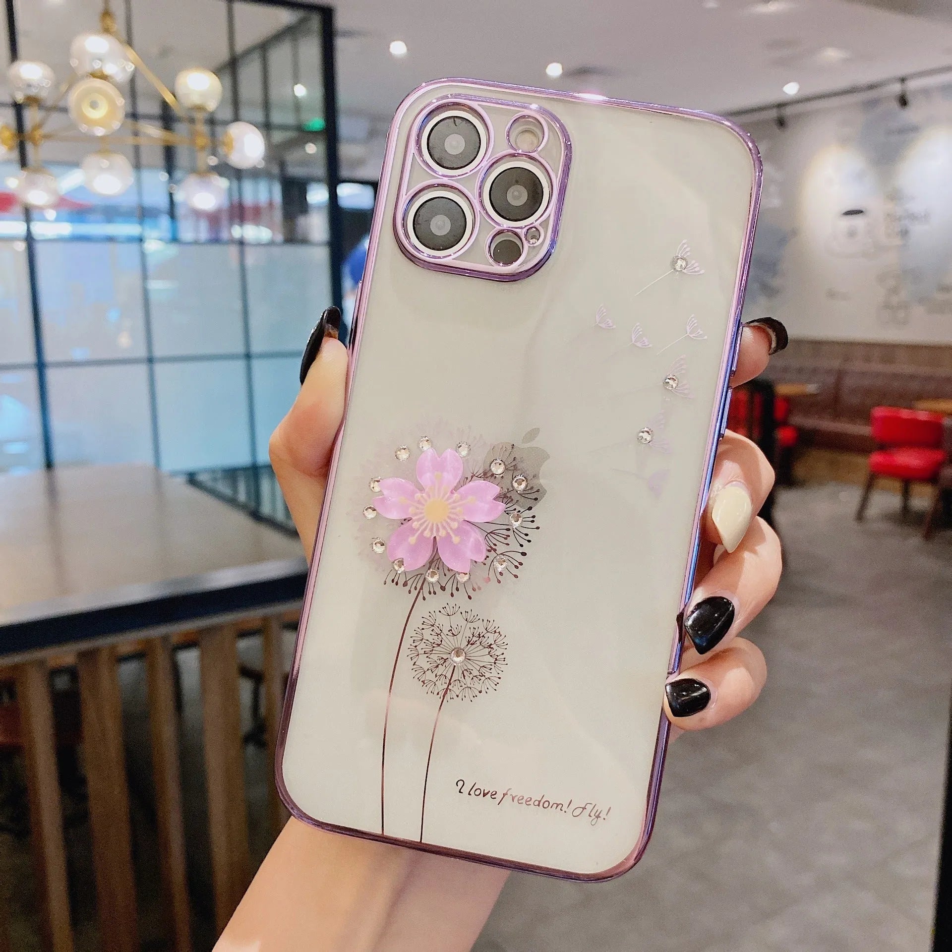 Green iPhone case with 3D floral design and extended rotating kickstand, showing built-in screen protector.
