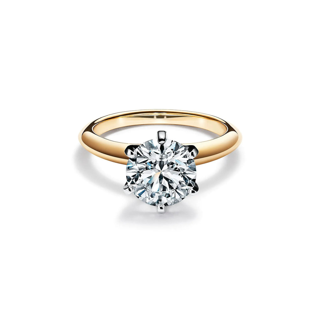 Women's silver electroplated ring in 2 carat gold finish, band style, size 7