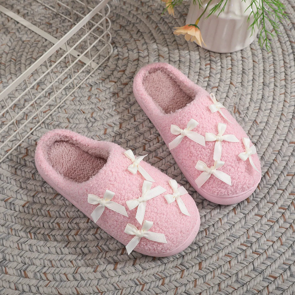 Women's Korean style bow slippers in white and pink, plush upper, TPR sole, flat heel, sizes 36-45