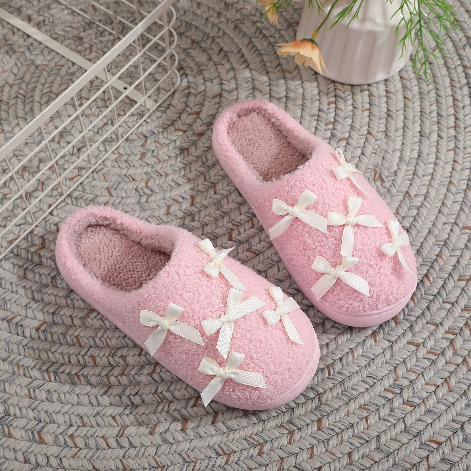 Women's Korean style bow slippers in white and pink, plush upper, TPR sole, flat heel, sizes 36-45