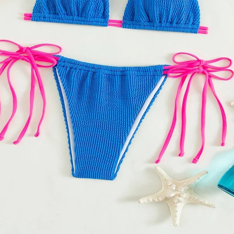 Women's black lace-up bikini swimsuit with adjustable ties and solid colour design