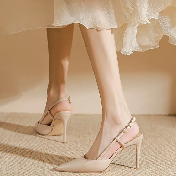 Apricot women's high-heeled sandals with a buckle toe strap, shown with a rubber sole.