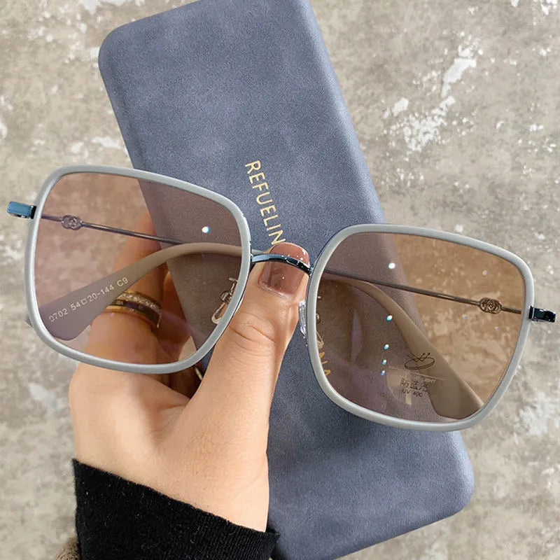 Photochromic myopia glasses with large frame, anti-blue light lens, and Black Gold frame colour options