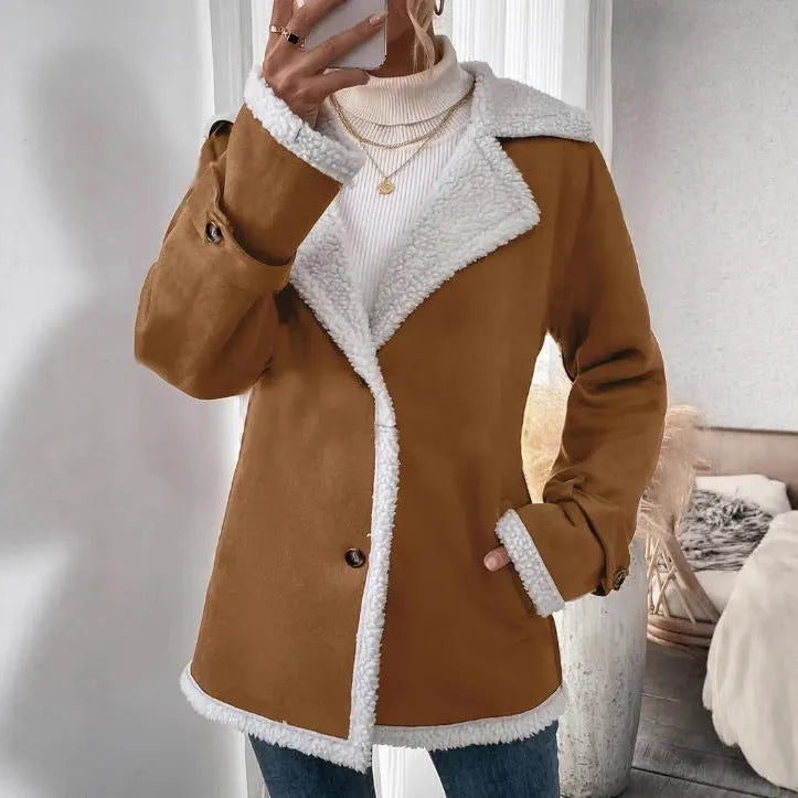 Women's light brown suede lapel mid-length jacket with pockets, loose fit, on hanger