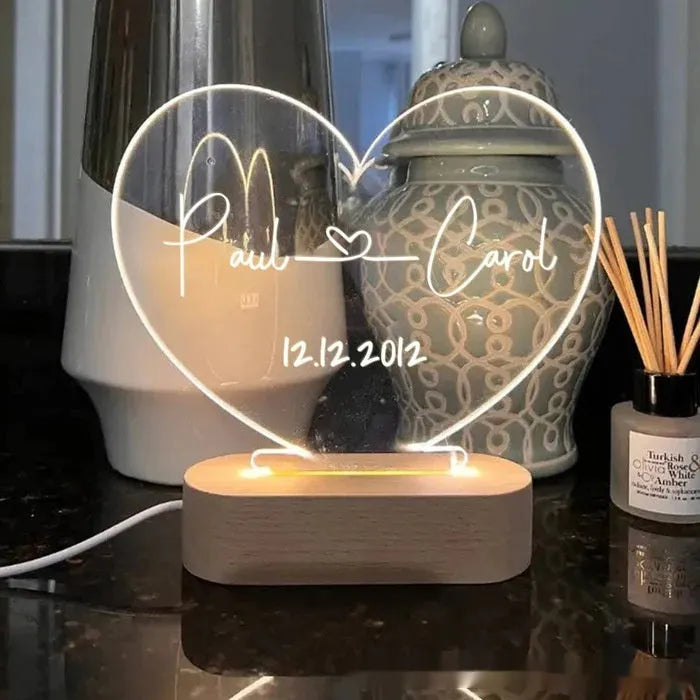 Transparent custom acrylic night light with personalised text, measuring 20cm by 11.5cm.