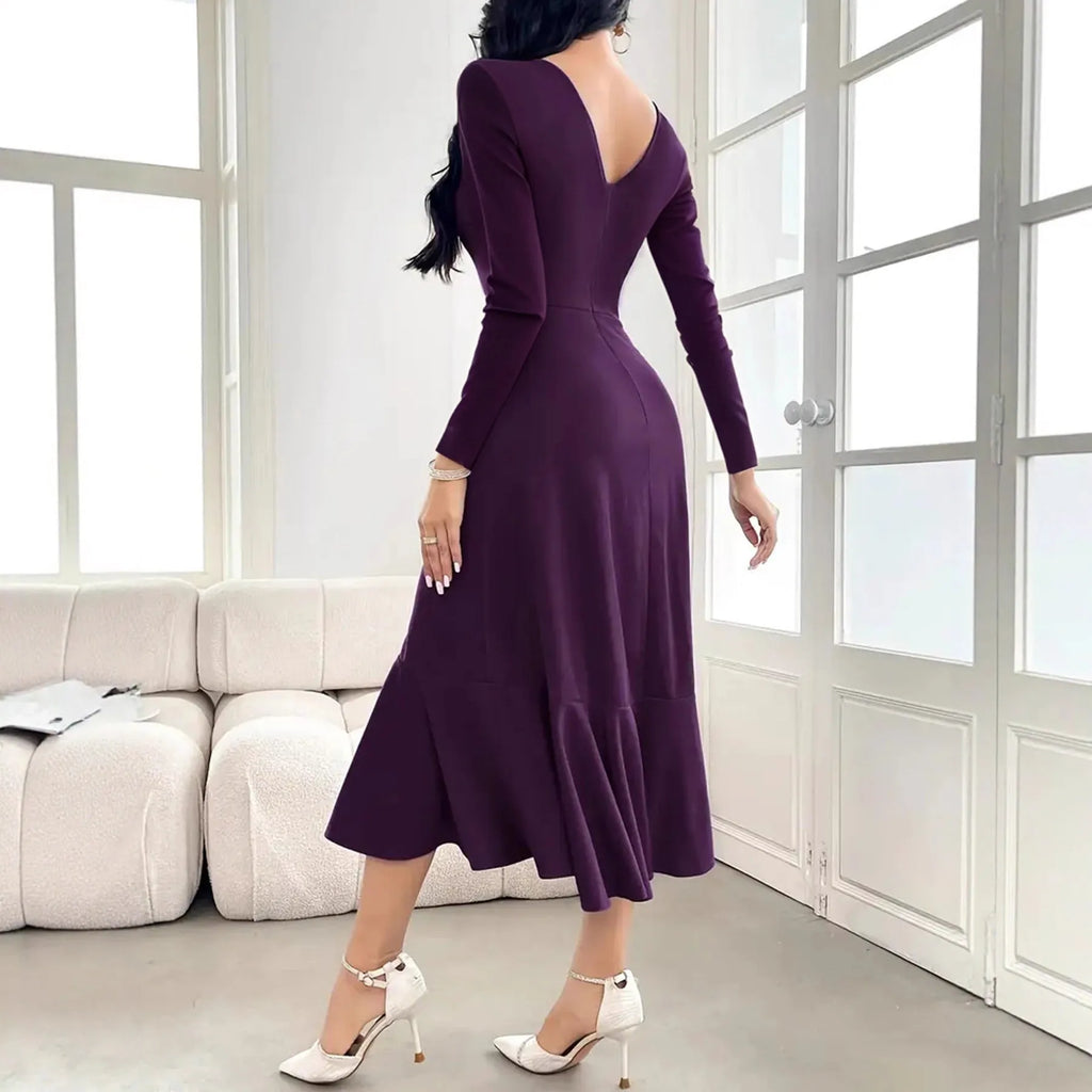 Purple women's long sleeve round neck dress with mid waist and ruffle detail.