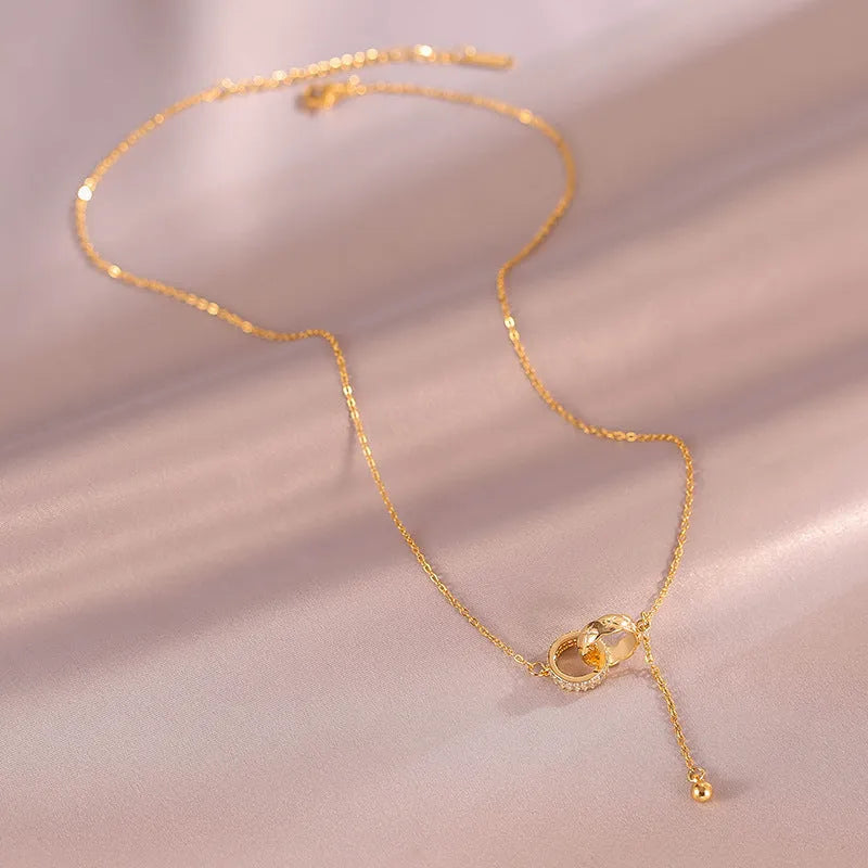 Titanium steel tassel clavicle chain necklace with double ring pendant in gold or silver finish