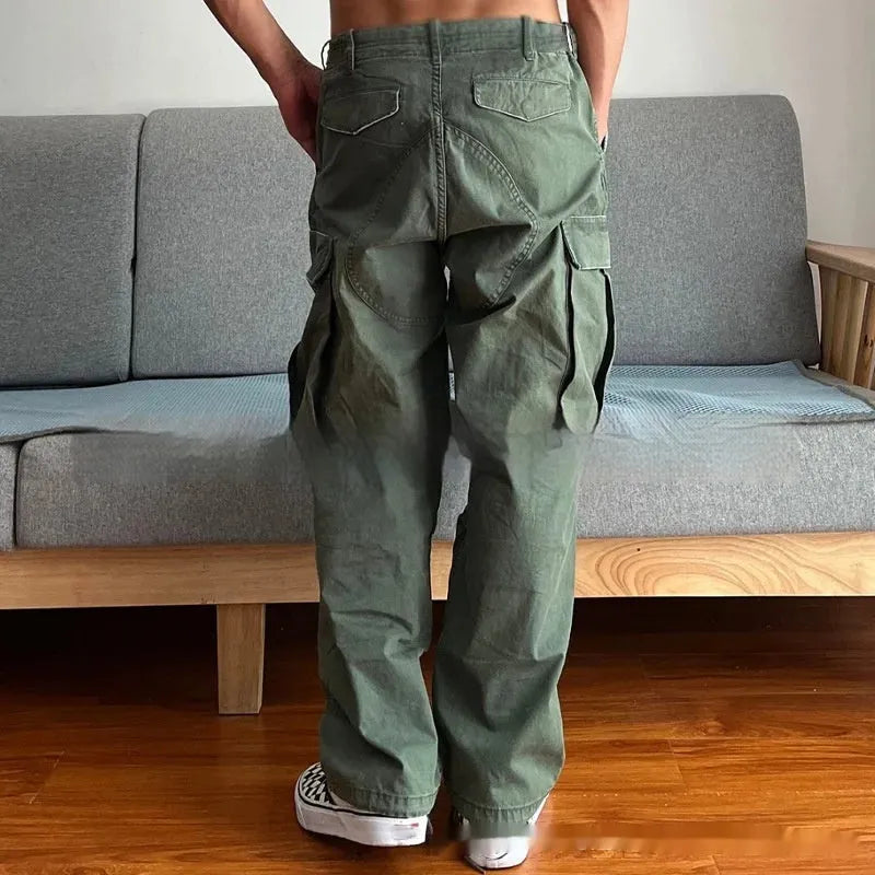 Men's army green washed cotton paratrooper trousers with large pockets, mid waist and zipper fly, sizes S to XXL