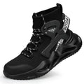 Men's black and white steel toe cap safety work shoes with fly woven mesh upper and rubber sole on concrete floor