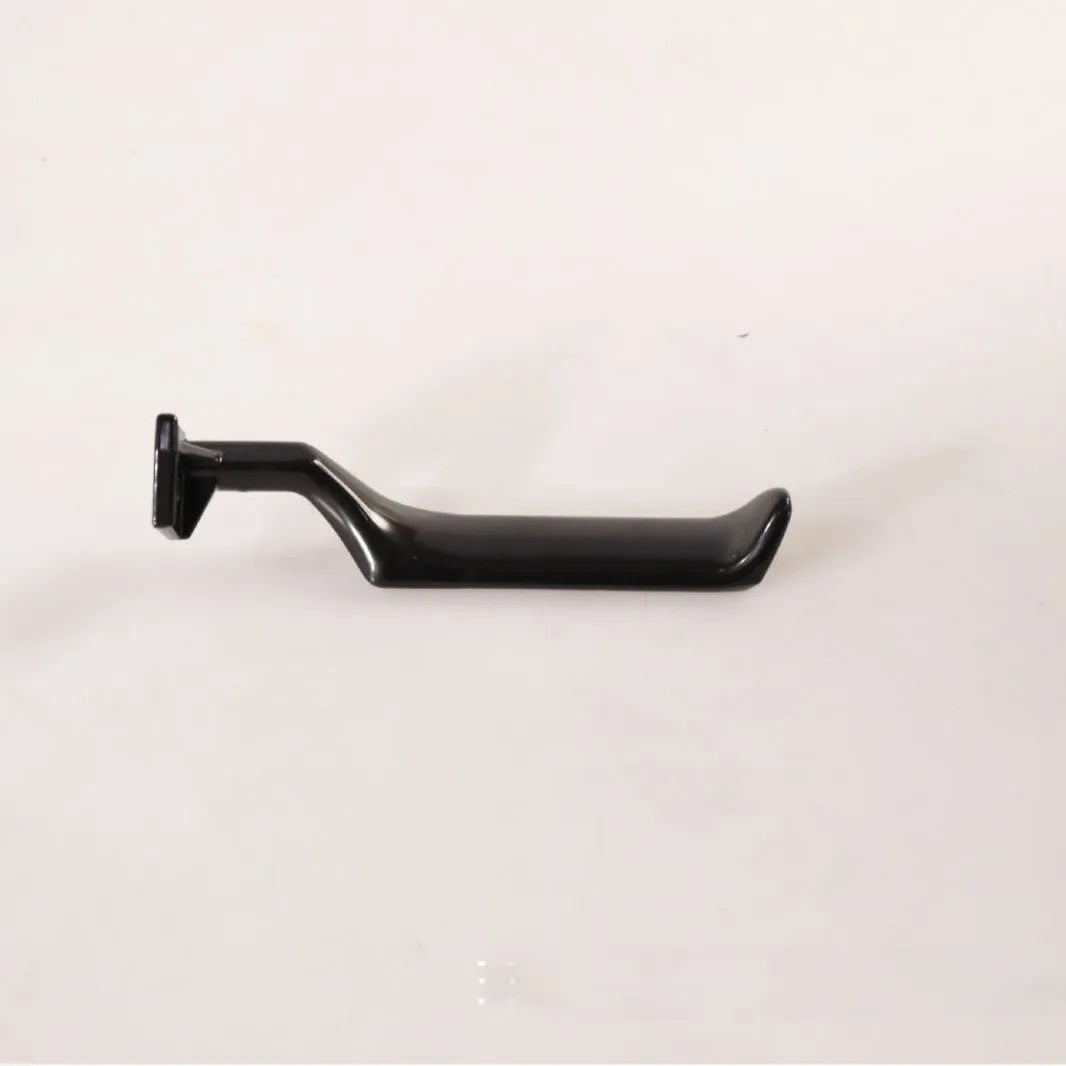 Pair of black zinc alloy automobile interior door handles, one left-hand and one right-hand.