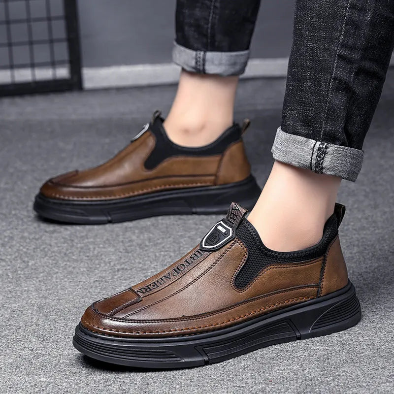 Men's solid black and brown leather casual shoes with round toe design on size chart.