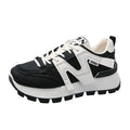 Women's low-top sneakers in white or black with artificial PU upper and rubber sole