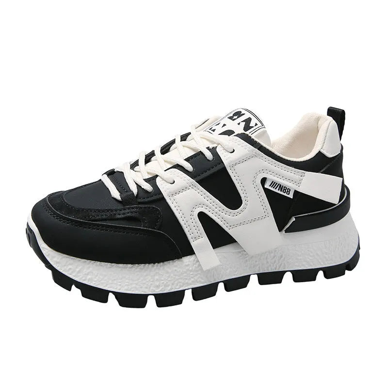 Women's low-top sneakers in white or black with artificial PU upper and rubber sole