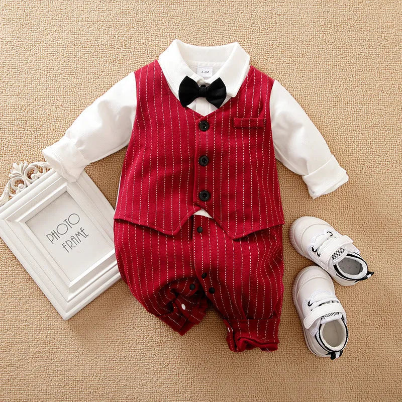 Baby boy wearing a wine red cotton gentleman-style long sleeve jumpsuit with single-breasted closure.