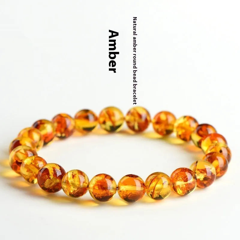 Natural yellow piebald amber bracelet with flower spot patterning and geometric design