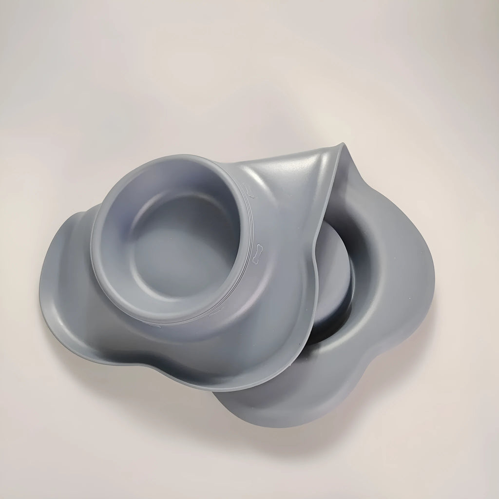 Large silicone pet bowl with stainless steel inserts in dual compartment design