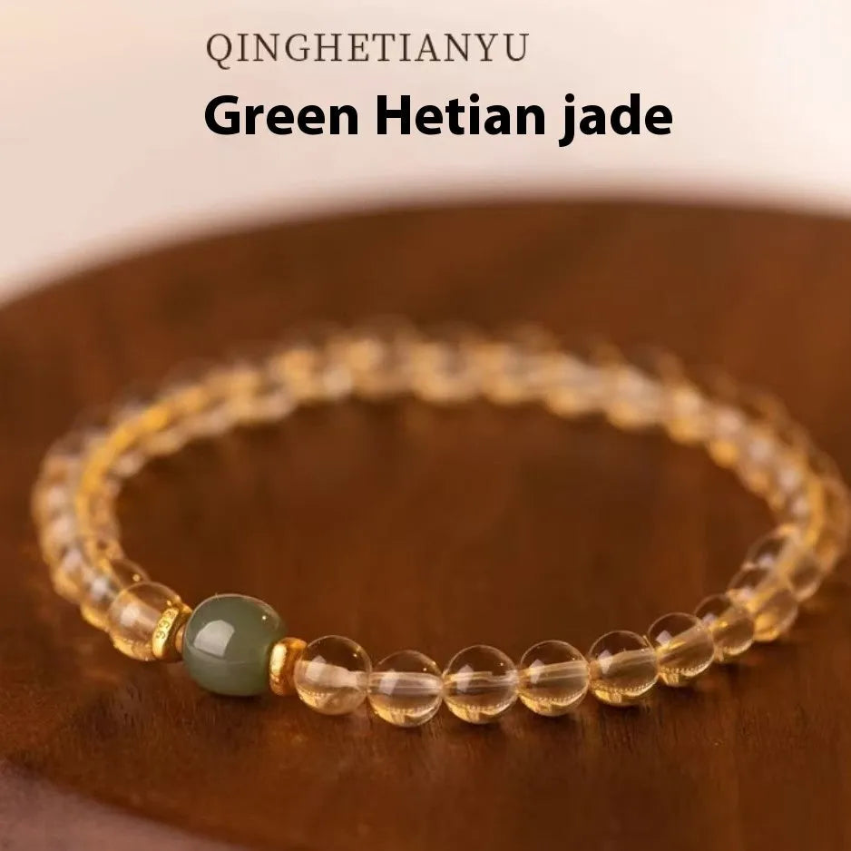 Handmade natural gold rutilated quartz bracelet from Brazil with Putuo stone and pearl accents