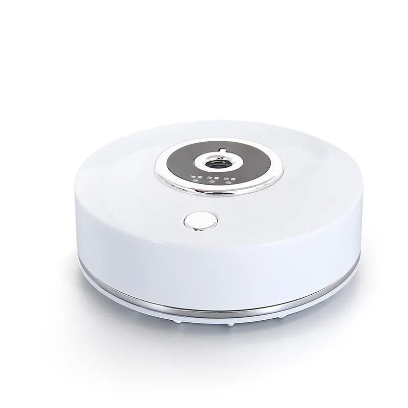 USB car aromatherapy machine in black, grey, or white with anti-slip pad on dashboard