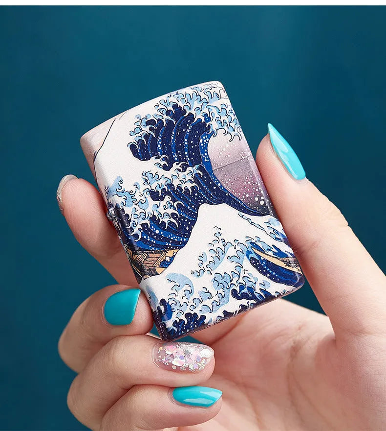 Coloured lacquer windproof lighter with Kanagawa surf design on copper housing, 58x39x13mm