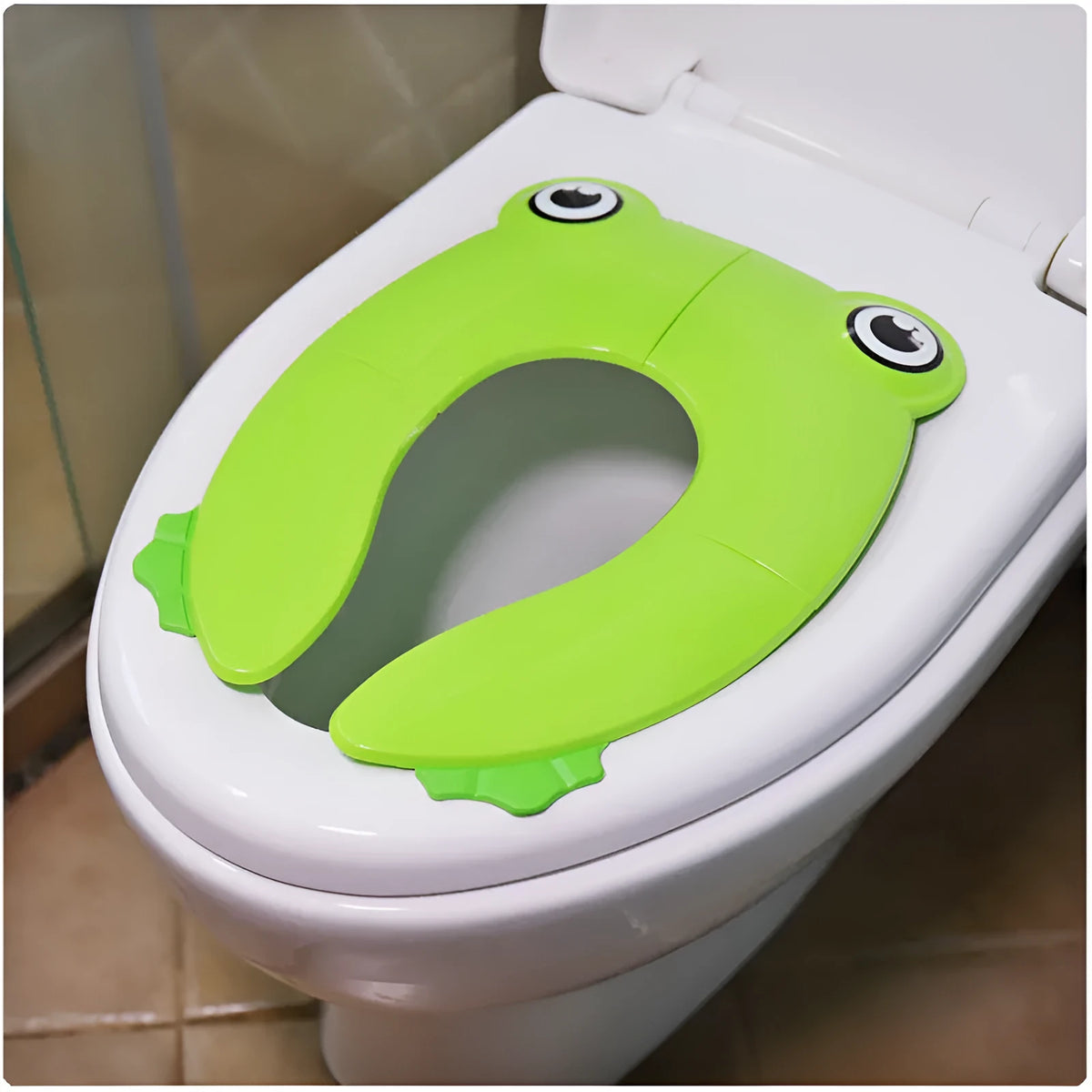 Children's toilet seat pad in PP, shown in blue or green with drawstring bag for toilet training