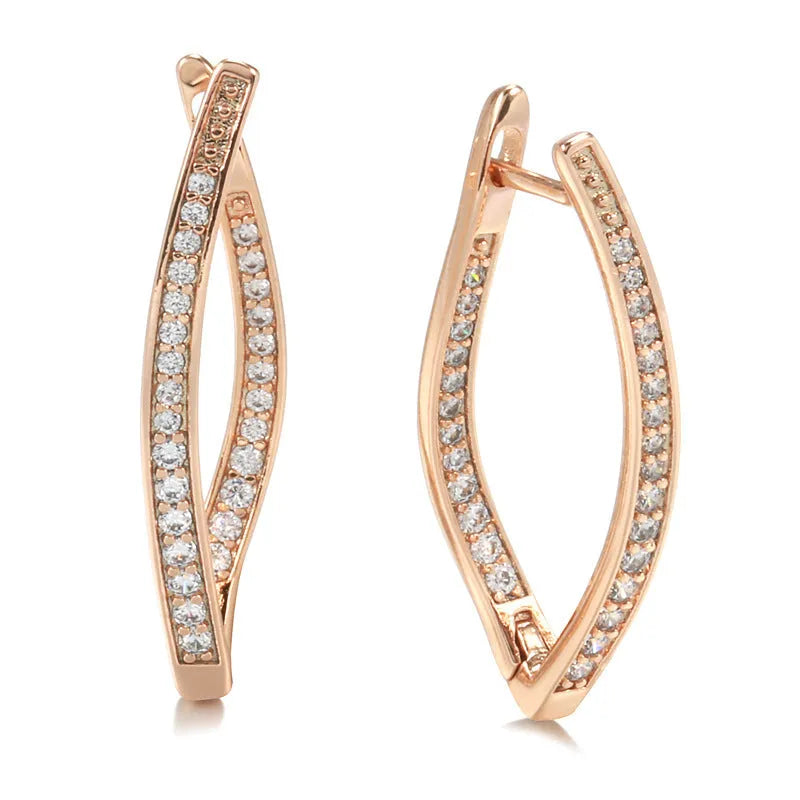 Pair of H0493 copper geometric drop earrings with zircon accents for women on light background