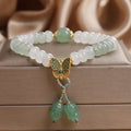 Green Tian Shan Cui abacus beads jade bracelet with retro butterfly and crystal tassel decoration