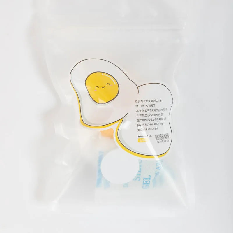 Interactive catnip ball toy with egg design mounted on wall for feline play