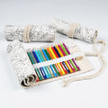 Canvas pencil case roll with starry sky pattern showing organised colour pencil slots