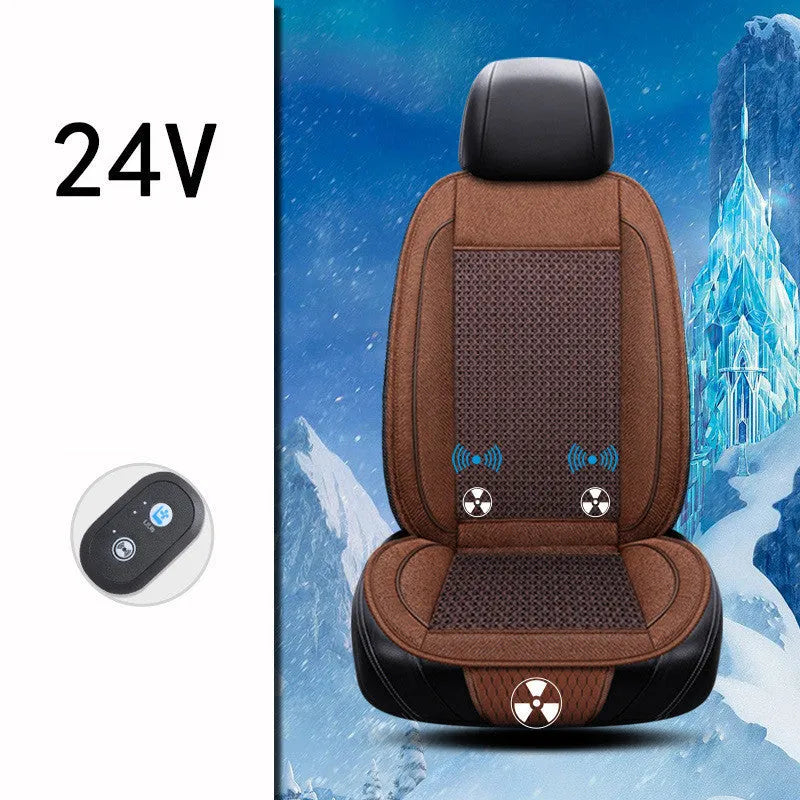 Black car ventilation seat cushion with power cord on car seat measuring 60 by 60 centimetres