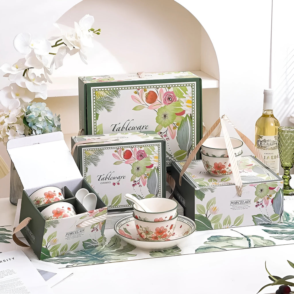Ceramic tableware gift box set with 4 bowls, 4 spoons, and 2 plates in matching underglaze finish