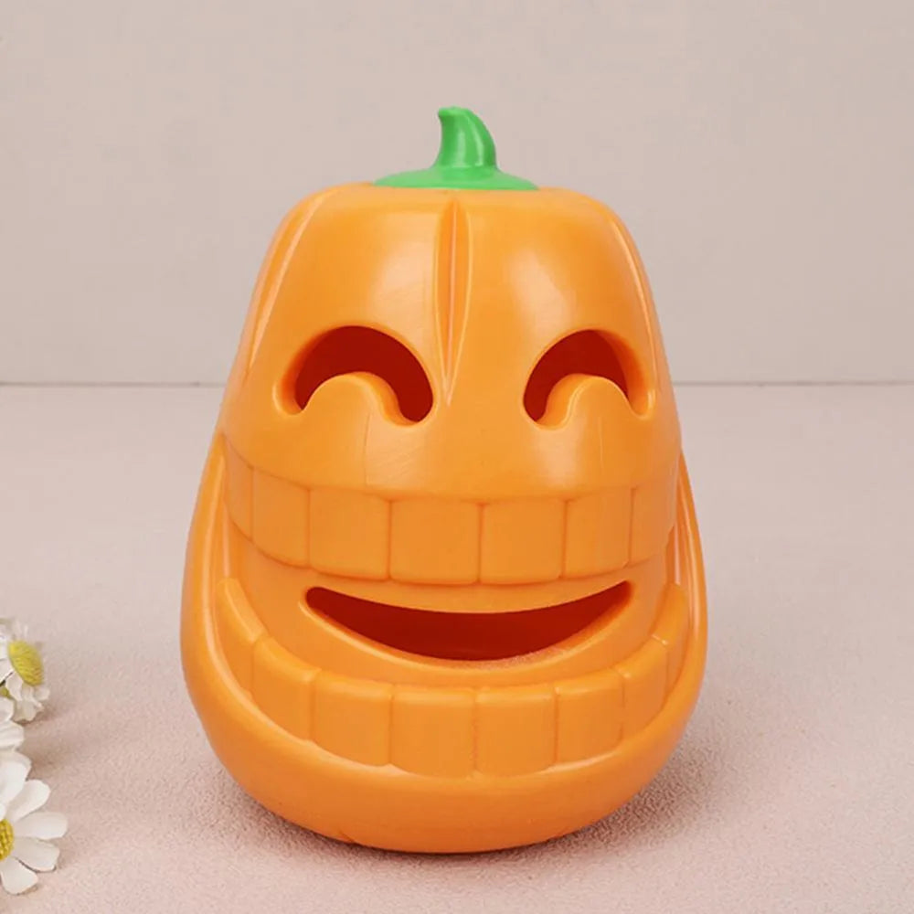 Yellow pumpkin-shaped TPR dog chew toy for aggressive chewers.