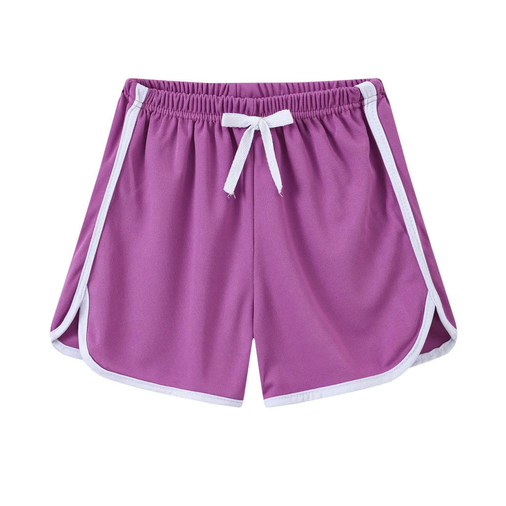 Children's polyester holiday shorts in multiple colours and patterns with height sizing from 100 to 140cm