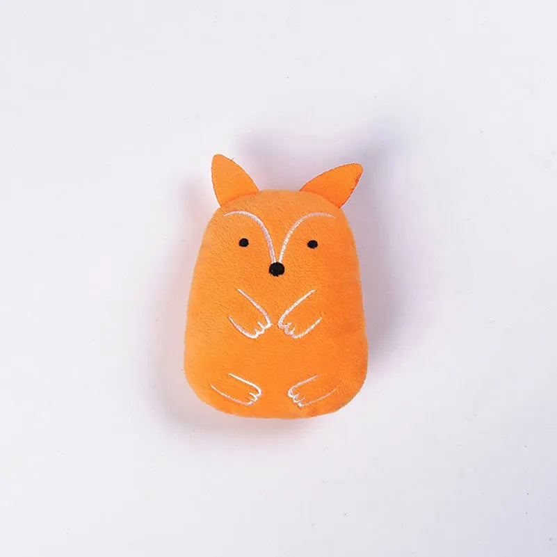Set of four small coloured plush cat chew toys with catnip, shown next to a measuring tape indicating 11 cm length.