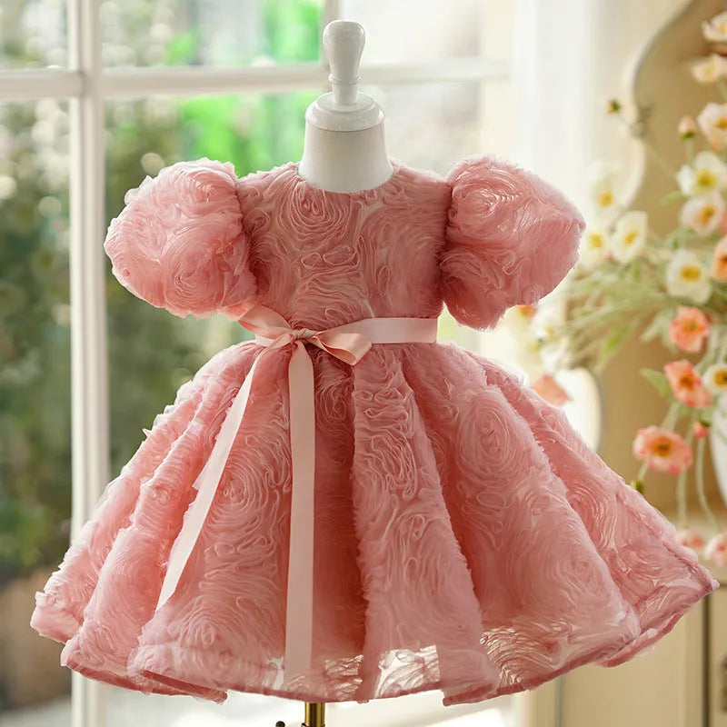 Children's girls birthday pettiskirt in bean pink with layered polyester design, front view