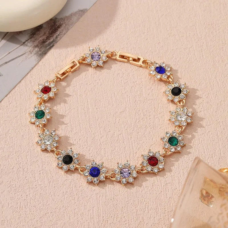 Zinc alloy electroplated flower bracelet with colourful crystal designs on wrist