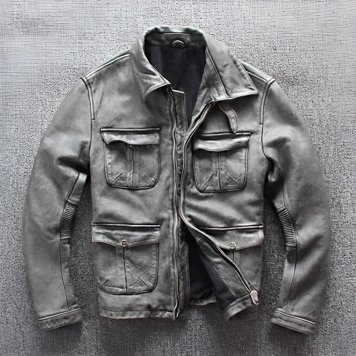 Men's gray genuine leather jacket with shirt collar, round hem, chest pocket, and color block pattern, sizes S-XXXXL.