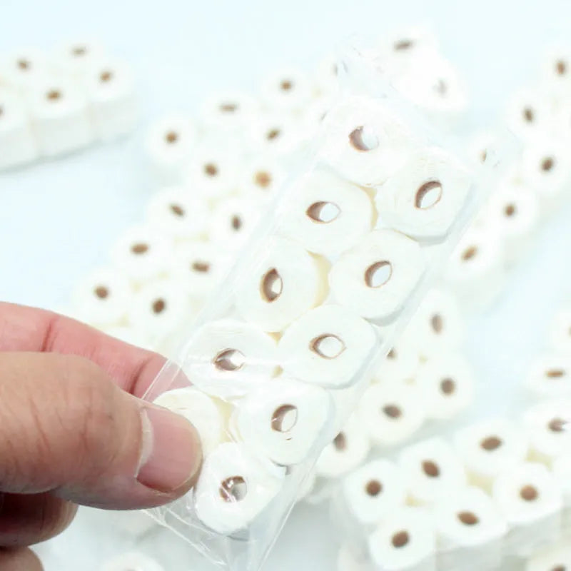 Miniature simulated toilet paper roll model for children's dollhouse play measuring 30mm by 15mm by 80mm