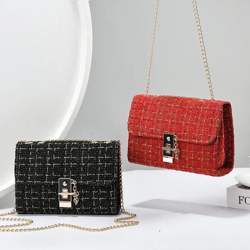 Woolen twist lock shoulder bag with gold silk contrast colour, clamshell design, and chain accent in beige