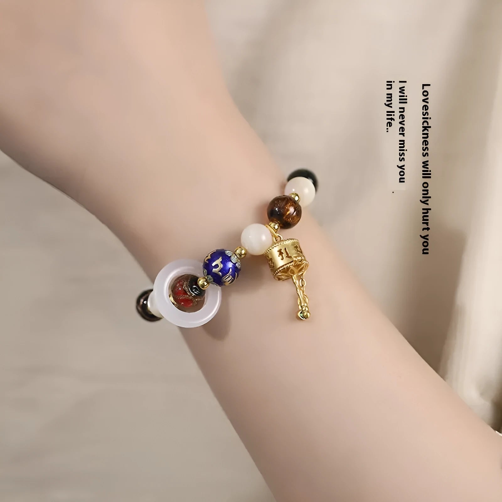 Hand-woven coloured glaze bracelet with Sunstone and white lip shell beads