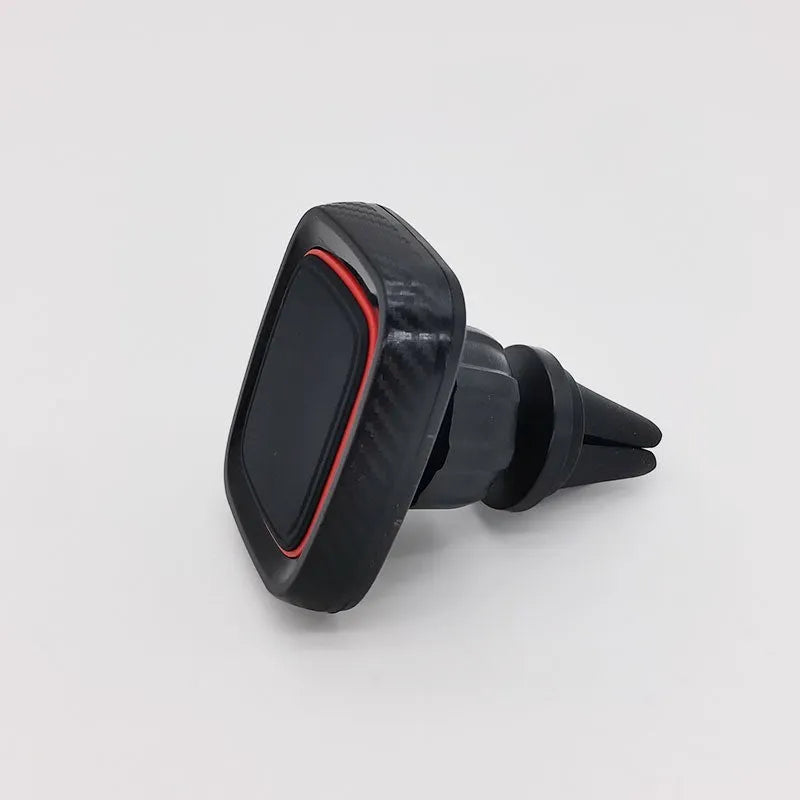 Black flexible gooseneck air vent phone holder mounted on a car dashboard