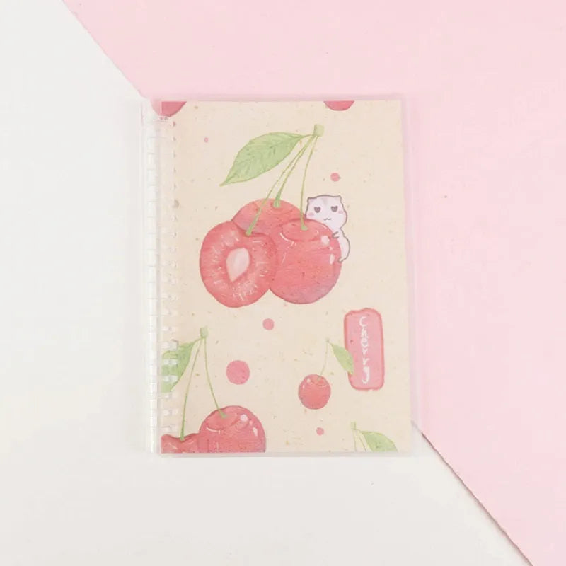 Children's hand-ledger notebook with hardcover showing animal designs including whale and fruit patterns