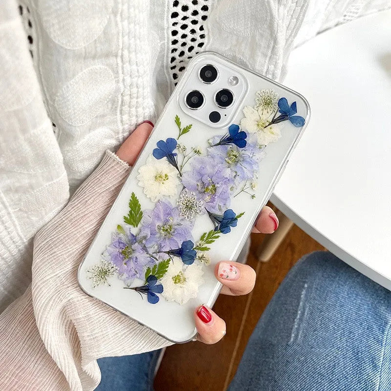Blue and purple dried flowers design on a soft TPU case for iPhone