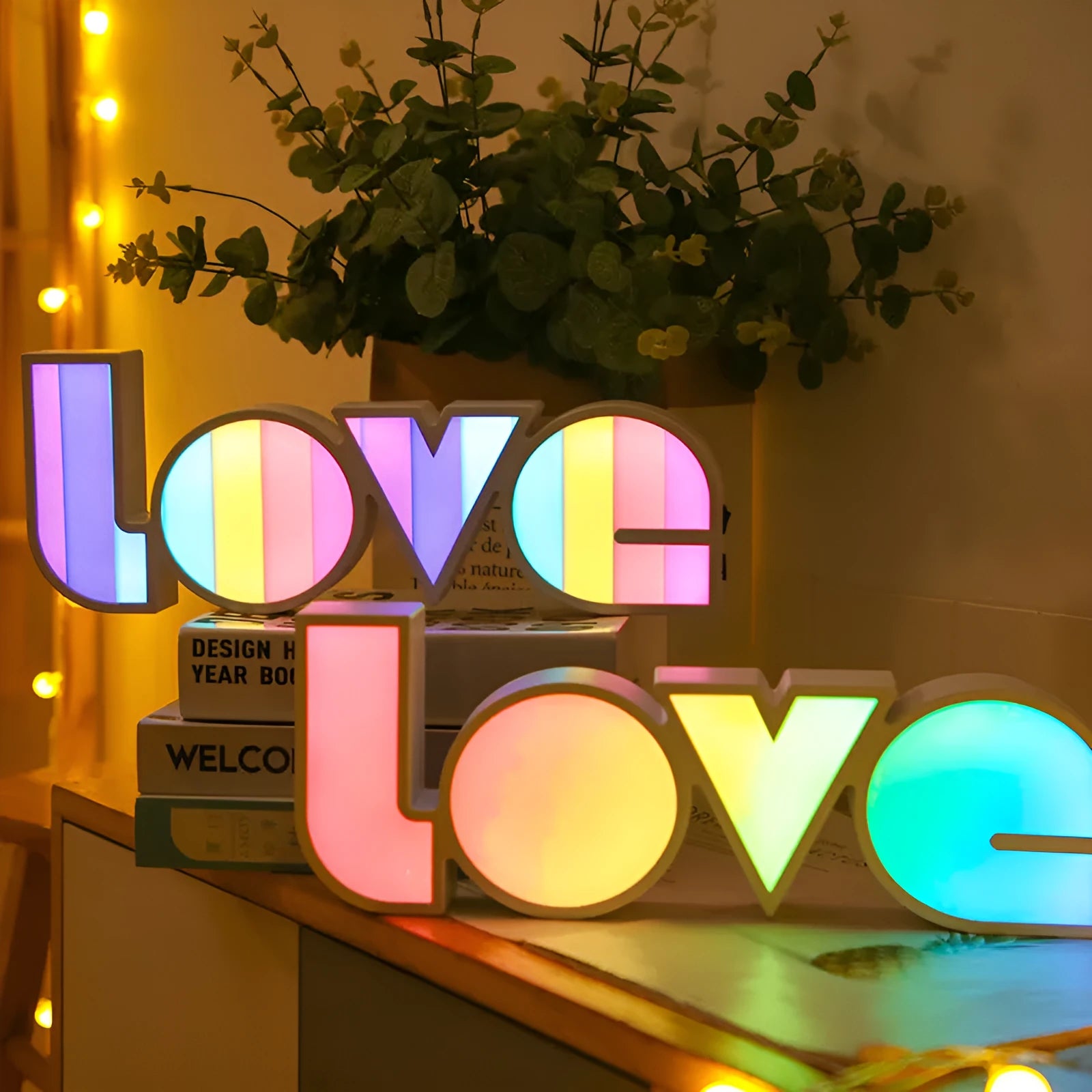Colourful LED LOVE word light with rainbow halo lampshade for romantic decoration.