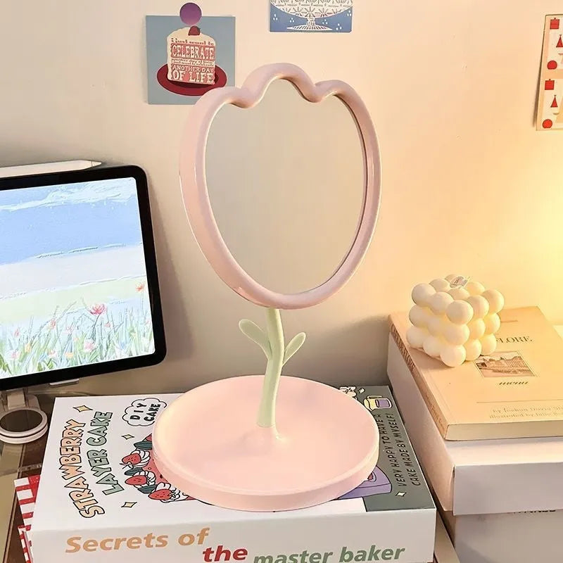 Tulip desktop vanity mirror with plastic frame and glass lens in pink colour, cartoon-style design