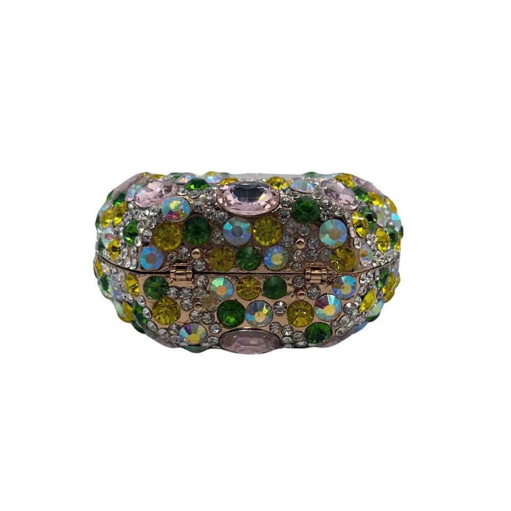 Women's alloy clutch bag with three-dimensional design in metallic colours
