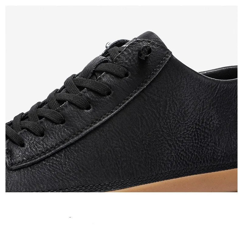 Black men's leather lace-up casual shoes with a round toe and flat rubber sole.